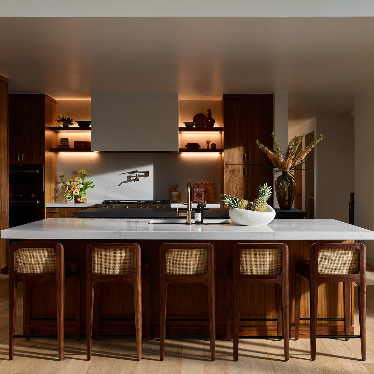 Canyon Counter Stools featuring solid wood frames and woven backs in a modern kitchen