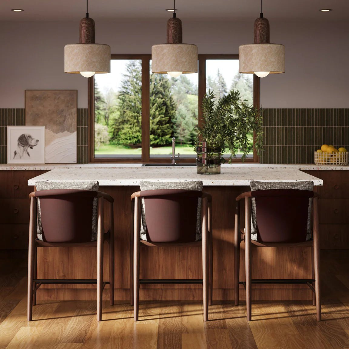 Modern kitchen interior with a wood island, three leather counter stools, and pendant lighting, styled with warm finishes as part of Denver Modern’s Winter Collection.