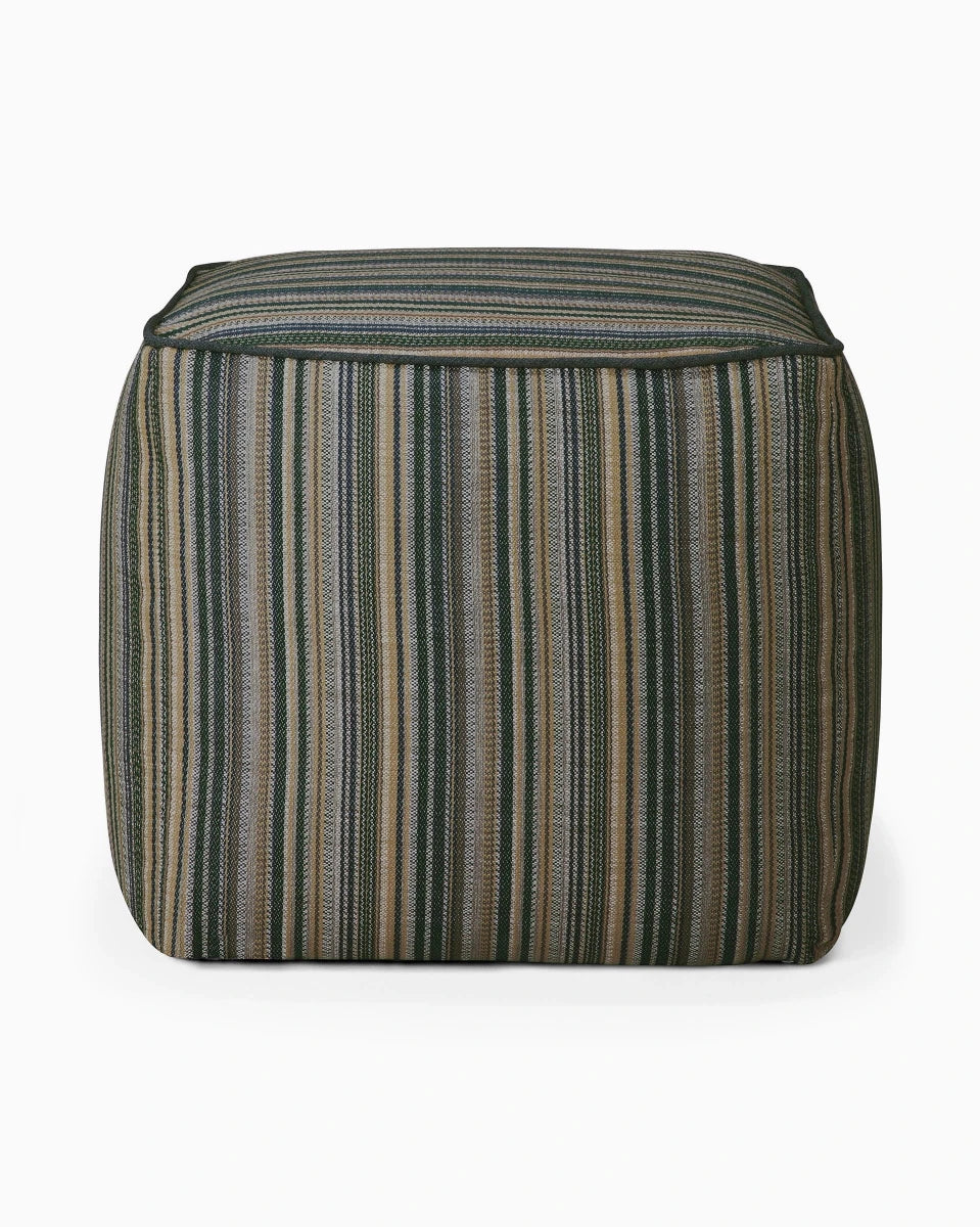 Cube-shaped outdoor pouf with vertical stripe pattern in green, tan, and gray tones.