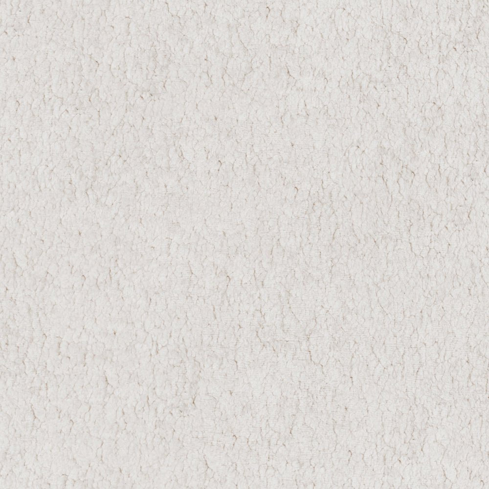 Cream-colored textured surface with subtle speckled pattern throughout.