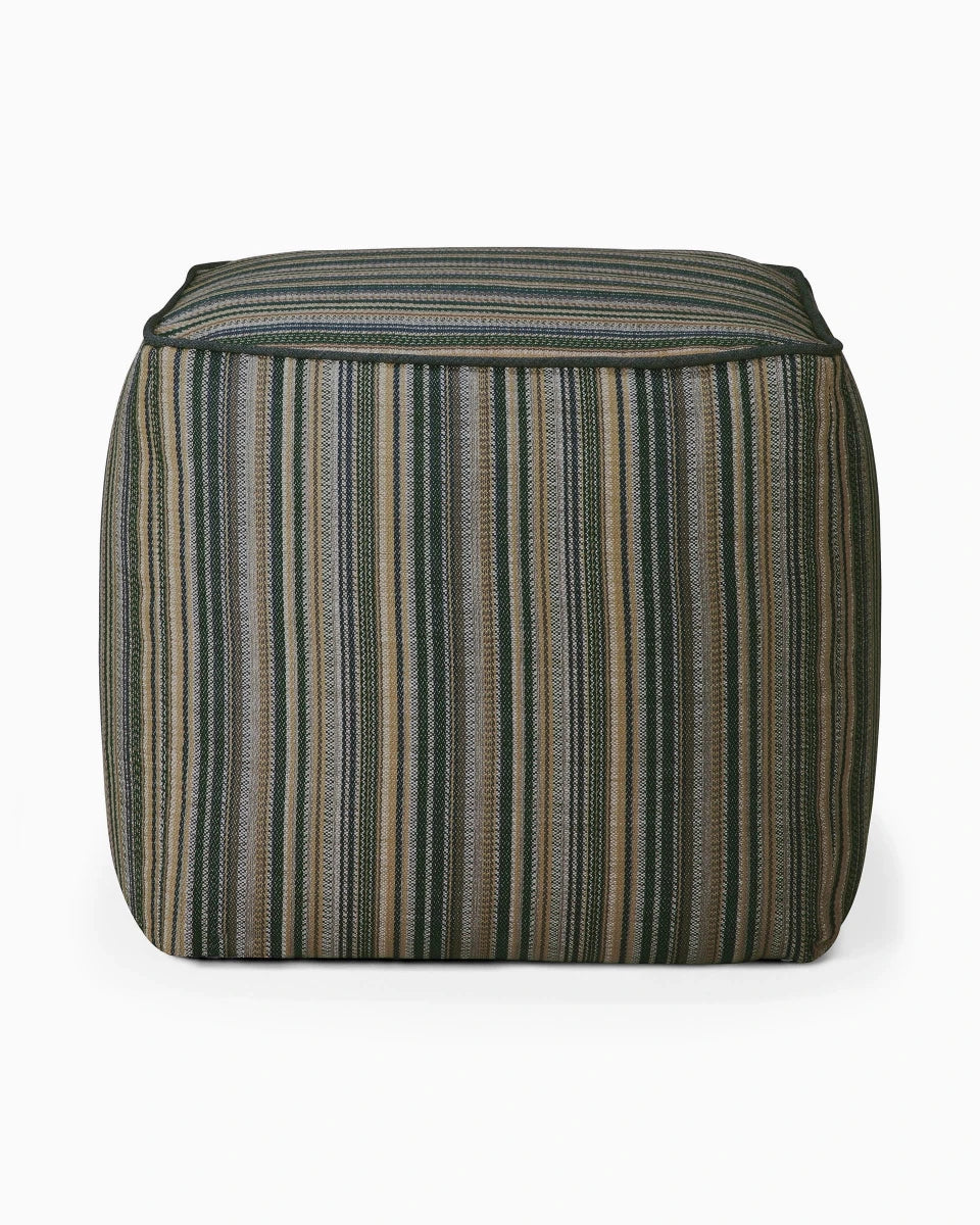 Cube-shaped outdoor pouf with vertical stripe pattern in green, tan, and gray tones.