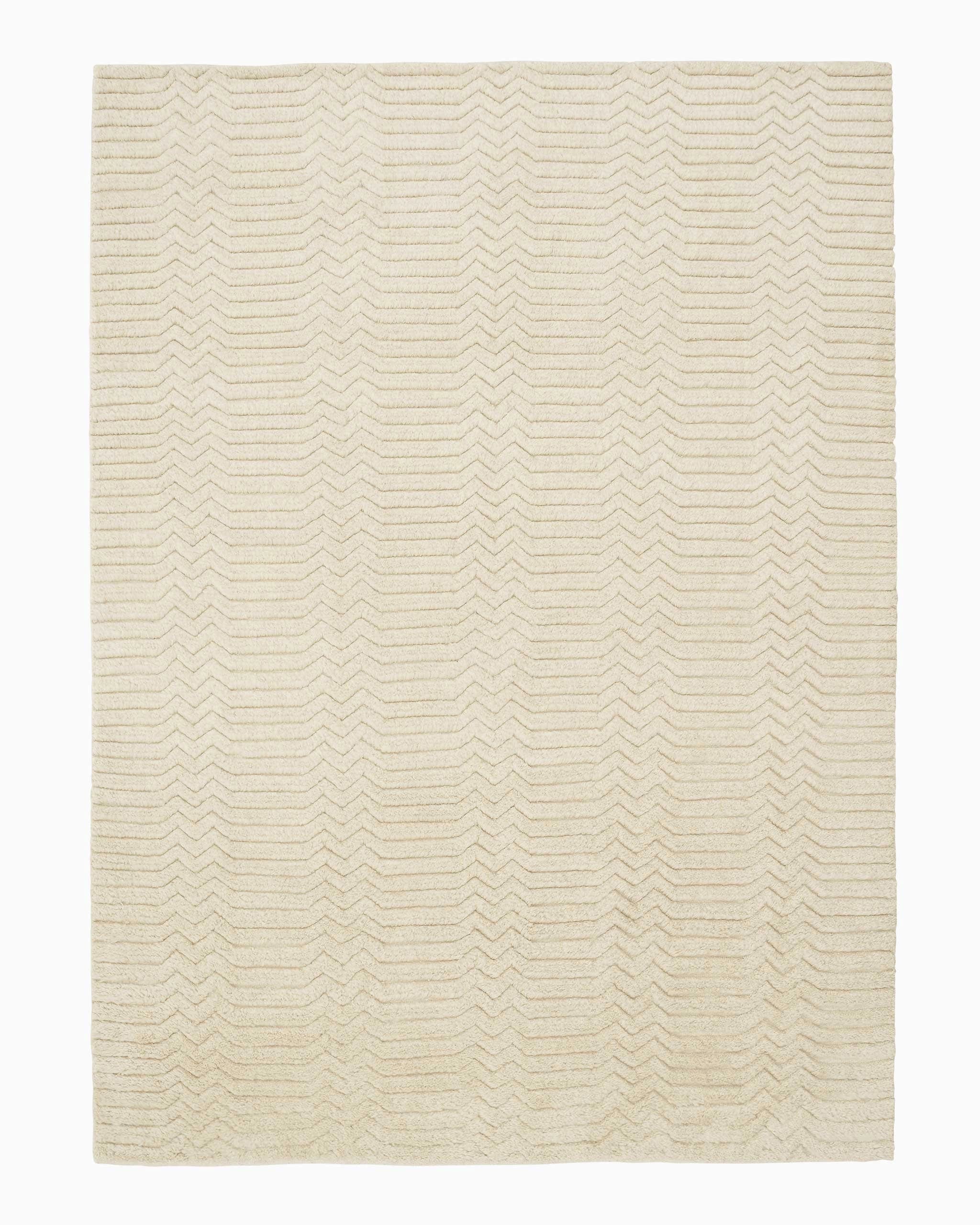 https://denvermodern.com/cdn/shop/files/Armadillo_Rugs_Savannah_Natural_Topshotcopy2_2048x.webp?v=1686771367