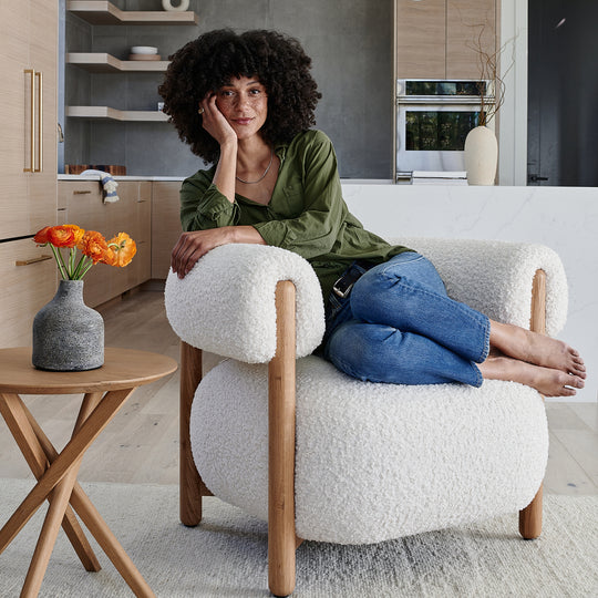 a woman sitting in a chair