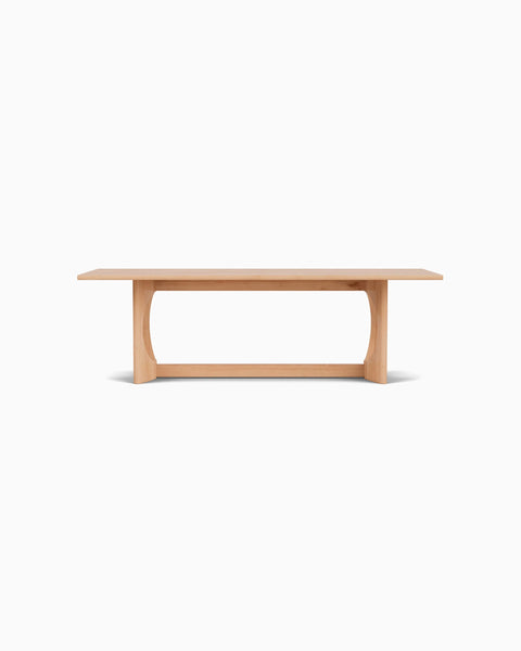 a wooden table with a white background