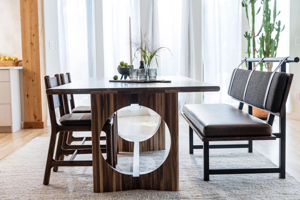 Dining room with a modern wooden table and Avon Dining Chairs with the Banquette.