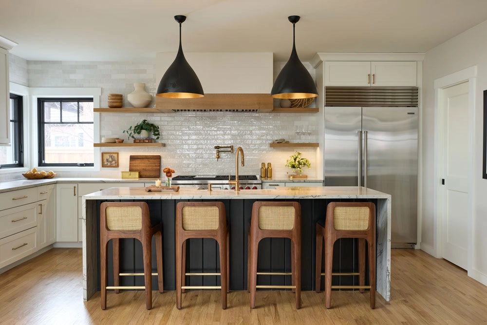 Modern kitchen with island with Canyon Counter Stools, and stainless steel appliances.