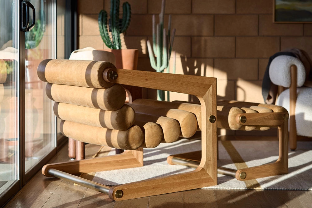 Durango Lounge Chair in a sunlit room with cacti and a rug.