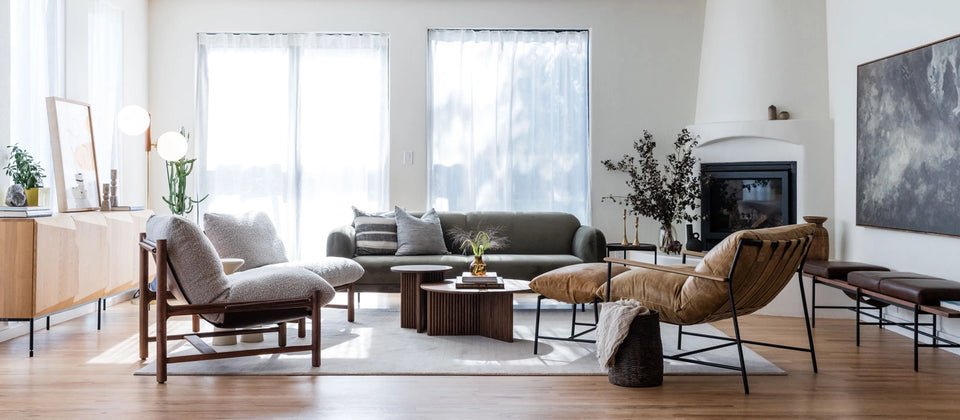 a living room with couches and a coffee table