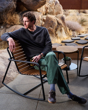 a man sitting on a chair