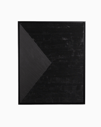 a black rectangular object with a triangle